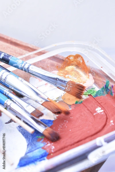 Fototapeta a set of dirty brushes and paintbrushes from having painted too much
