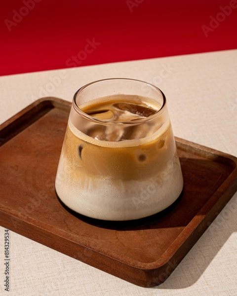 Fototapeta coffee concoction containing milk and palm sugar