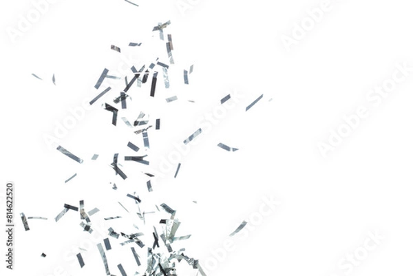 Fototapeta Silver Confetti Foil fall splashing in air. Silver Confetti Foil explosion flying, abstract cloud fly. Many Party glitter scatter in many group. White background isolated high speed shutter freeze