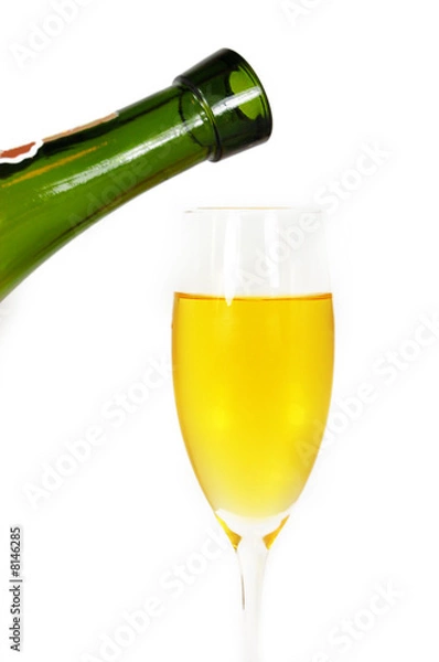 Fototapeta pouring some white wine in glass, isolated on white