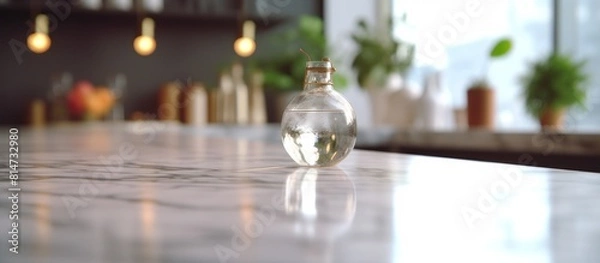 Fototapeta Beautiful empty marble table top with blurred bokeh modern kitchen interior background