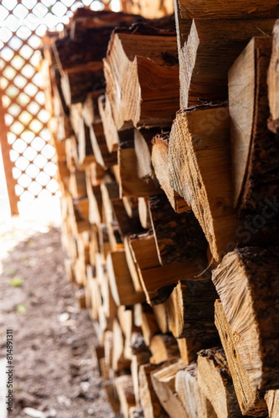 Obraz view of a neatly stacked woodpile close focus