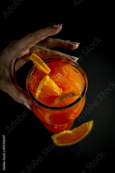 Obraz hand holding orange