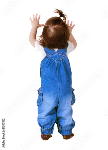 Fototapeta Child stands with hands up, isolated on white. Back view
