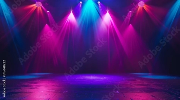 Fototapeta The stage of the theater illuminated by spotlights and smoke from the auditorium