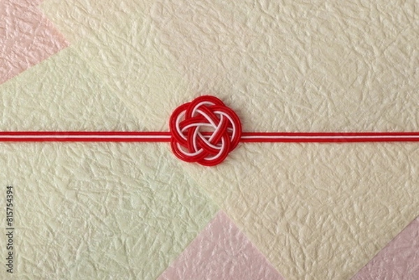 Fototapeta 水引飾りの和風背景　梅結び　背景もみ紙使用