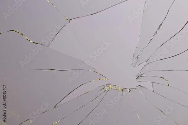 Obraz broken glass grey background