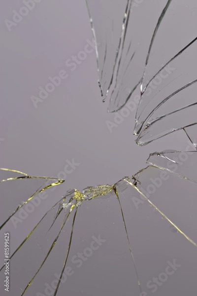 Obraz broken glass grey background