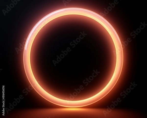 Obraz A glowing orange ring of light on a black background.