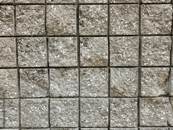 Fototapeta Cement brick mushroom finish mixed with mini pebbles Wall simple texture