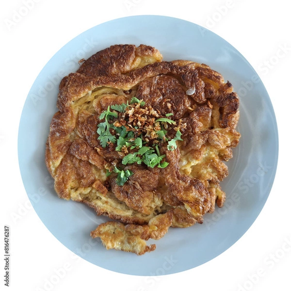 Fototapeta Freshly prepared Asian deep-fried crispy egg omelet.