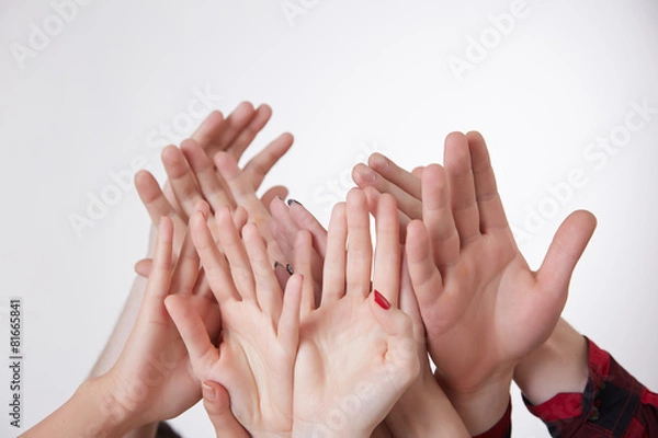Obraz many hands reaching up