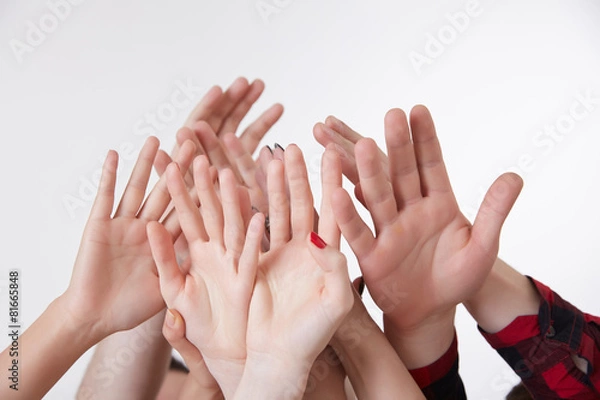 Obraz many hands reaching up