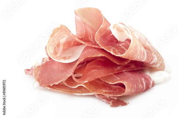 Obraz Włoskie prosciutto crudo, udko z surowej szynki pokrojone na biało