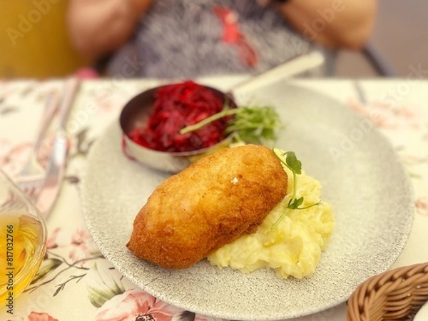 Fototapeta Devolay cutlet, Kiev cutlet, breaded and wrapped meat, mashed potatoes, beetroot, dinner plate, gourmet