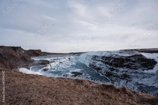 Obraz Snowy waterfall with ice
