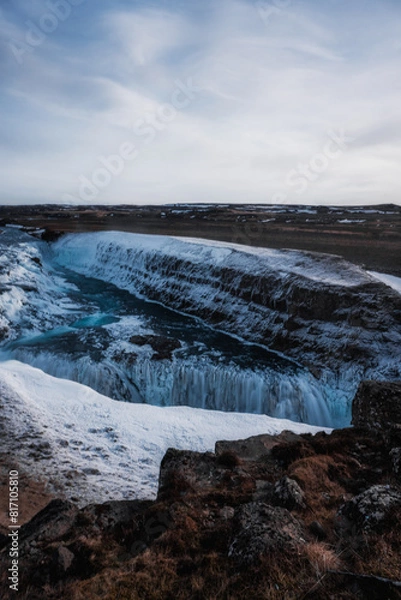Fototapeta Snowy waterfall with ice