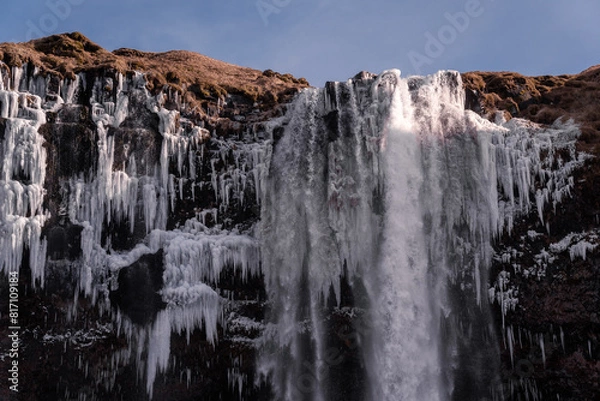 Obraz Snowy waterfall with ice
