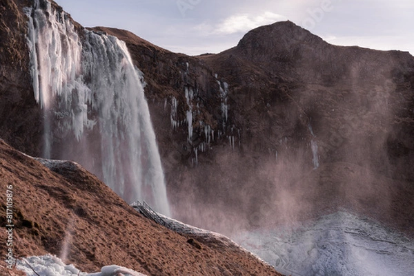 Obraz Snowy waterfall with ice