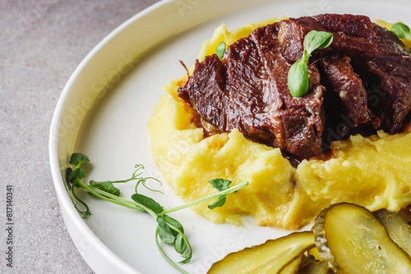 Obraz delicious stewed beef cheeks on mashed potatoes