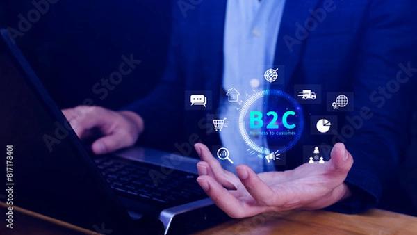 Obraz B2C, Business to customer marketing strategy concept. Businessman holding with virtual B2C icon for business strategy, communication, feedback, online marketing, Ecommerce marketing strategy.