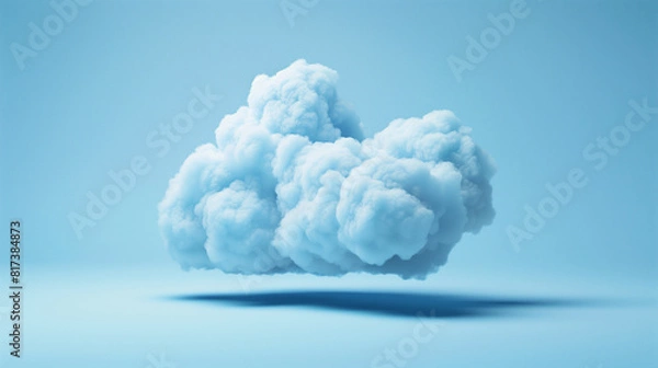 Fototapeta A fluffy white cloud is prominently visible against a clear blue sky background. The cloud appears soft and billowy in the bright blue atmosphere