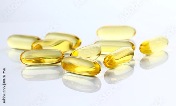 Fototapeta Kapsułki oleju rybnego, omega 3 na szarym tle