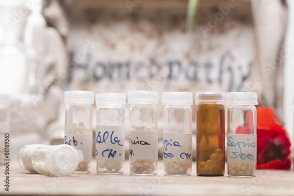 Obraz bottles with homeopathy globules