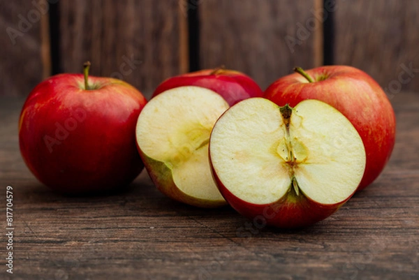 Obraz Four Polish red apples on a rustic background