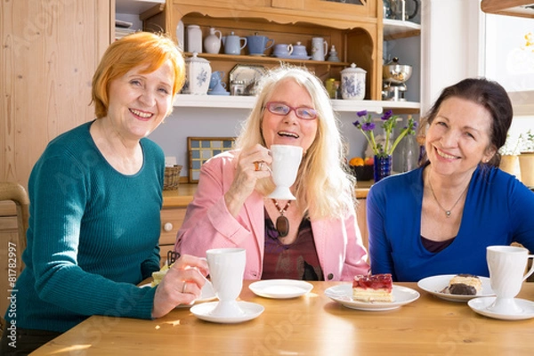 Obraz Smiling Mom Friends with Snacks Looking at Camera.