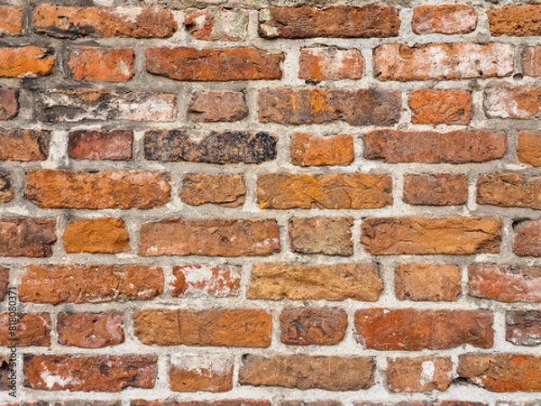Fototapeta old fortress wall of stones. Background of medieval brickwork for design.