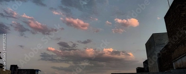 Fototapeta sunset over city