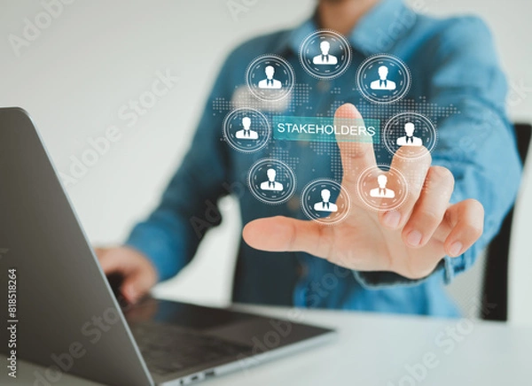 Fototapeta Stakeholders concept. Person touching stakeholders icon on virtual screen for business finance stakeholder investment management. Different stakeholders contact collaboration for company organization