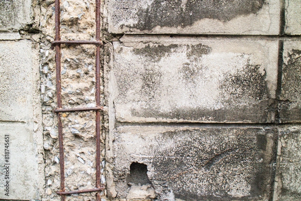 Fototapeta Rusty steel inside concrete columns, cracked concrete columns affecting, dangerous structures, Damages and Cracks in structural