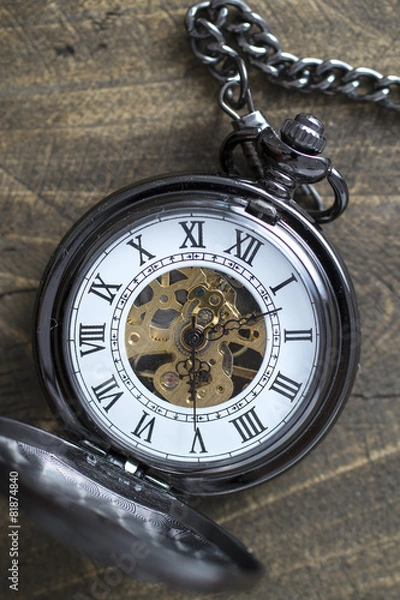 Obraz pocket watch on rustic wooden background