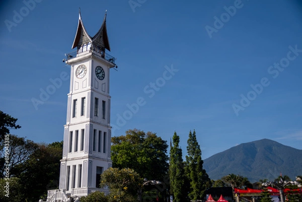 Fototapeta Jam Gadang is a historical and famous landmark in Bukit Tinggi, West Sumatera. Jam Gadang is the icon of the city and the most visited tourist destination.