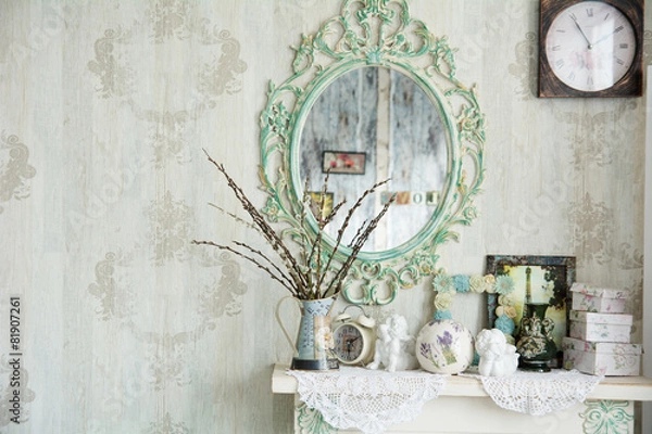 Fototapeta Vintage interior with mirror and a table with a vase and willows