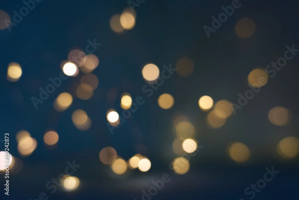 Fototapeta Christmas light background. New Year Holiday glowing backdrop. Defocused Background With Blinking light. Blurred Bokeh.