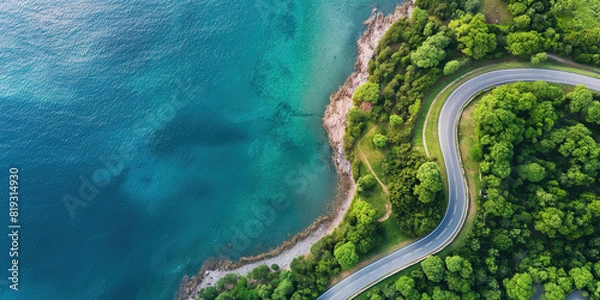 Fototapeta Winding road along the coast. View from a drone.