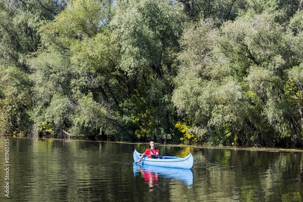 Obraz Young man in canoe