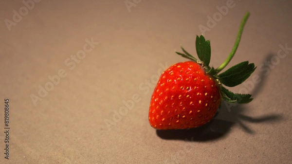 Obraz one strawberries on a table, aesthetic