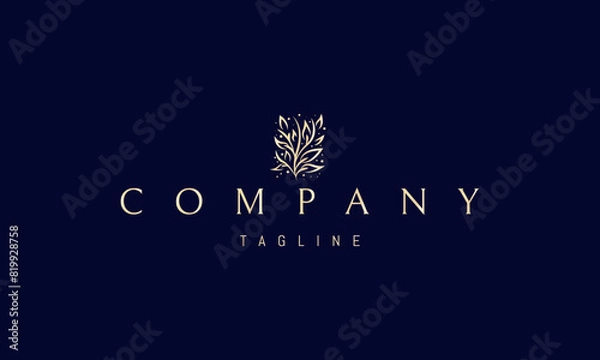 Fototapeta A vector golden logo with an abstract image of a thicket of bushes with leaves.