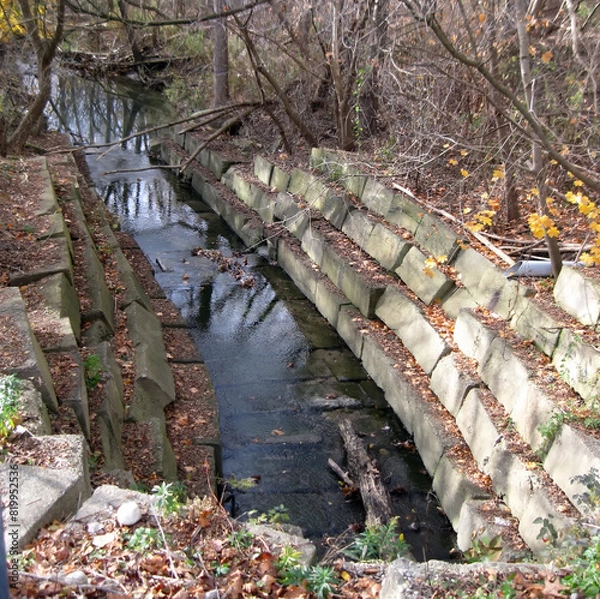 Obraz Using erosion control along the banks and bed of a river.
