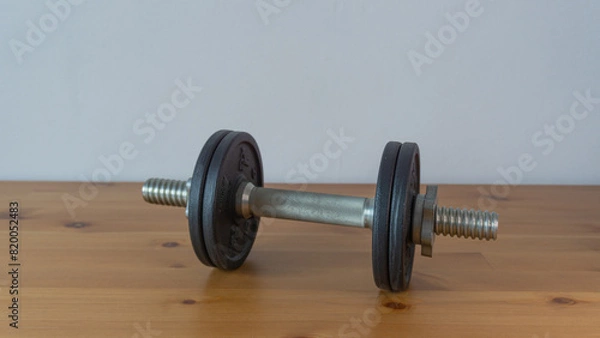 Fototapeta Strength Training with Quality Dumbbell
