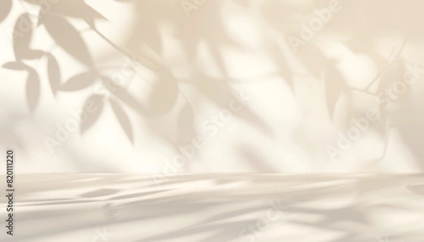 Fototapeta Beuty abstract background in neutral beige colors for product presentation. Shadows of vegetative leaves on wall for modern minimalist mockup backdrop.
