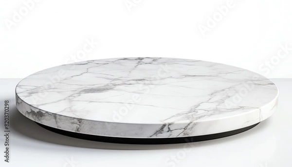 Fototapeta White round marble table top with black base.