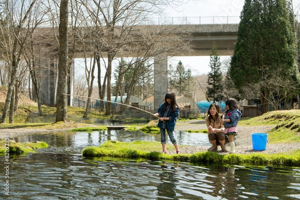 Obraz 釣りをする親子