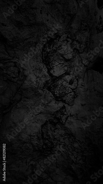 Obraz Empty black stone cave wall for abstract  background and texture. beautiful patterns, space for work, banner, wallpaper close up.Vertical.