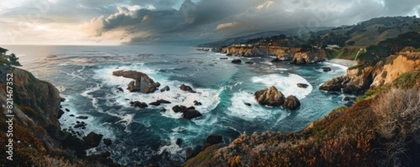 Fototapeta A beautiful ocean view with a rocky shoreline. The sky is cloudy and the water is choppy