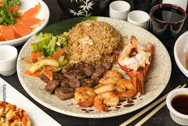 Fototapeta Steak, shrimp and lobster hibachi